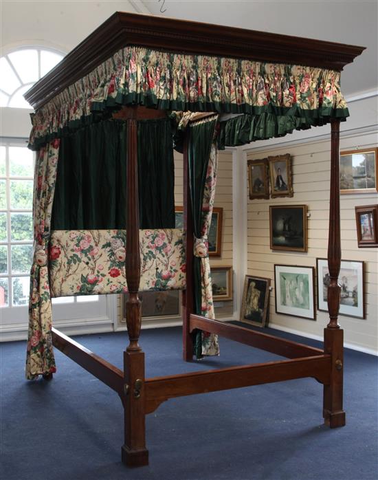 A George III style mahogany four poster bed, 7ft 1in. x 5ft 3in.